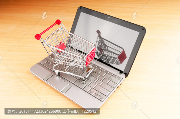 網(wǎng)絡(luò)購(gòu)物概念與電腦和購(gòu)物車