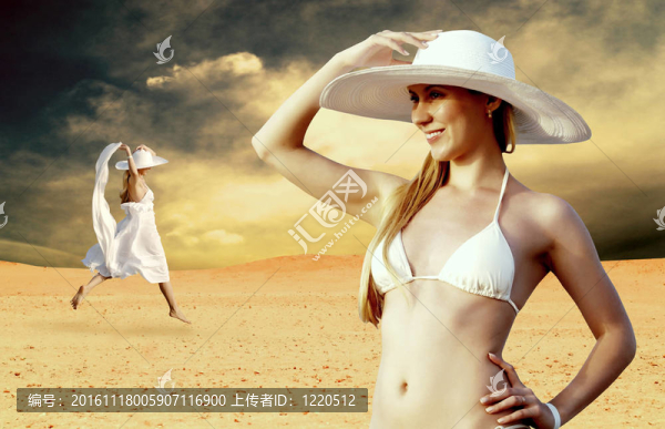 在whitebikini和帽子的年輕漂亮的女人；在陽(yáng)光明媚的沙漠松弛
