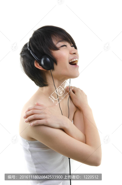 音樂。女人跳舞用耳塞