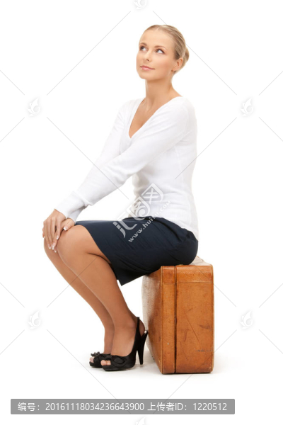 漂亮的女人，棕色的手提箱