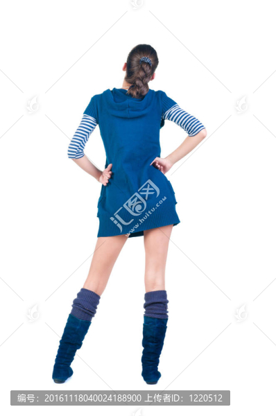 美麗的年輕女人看著墻。后視圖。
