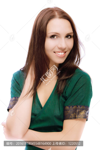 美麗的年輕女子在綠色服裝肖像