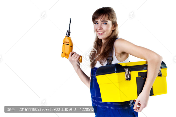 與鉆的情況下穿著工作服的漂亮女人