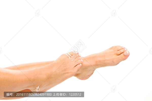 一個(gè)女人的腿上隔離的白色