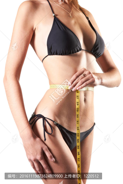 苗條婦女測量腰圍厘米卷尺