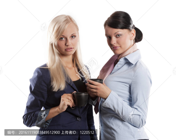 兩女商人休息喝咖啡時