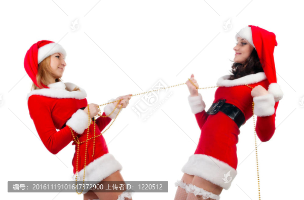 兩個(gè)在圣誕衣服的女孩。