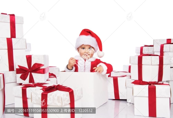 圣誕男孩在圣誕老人克勞斯坐在禮品盒內(nèi)