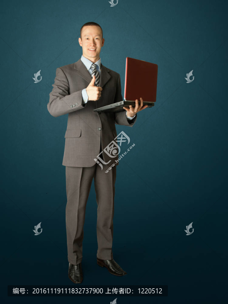 商人與筆記本電腦的全長(zhǎng)肖像