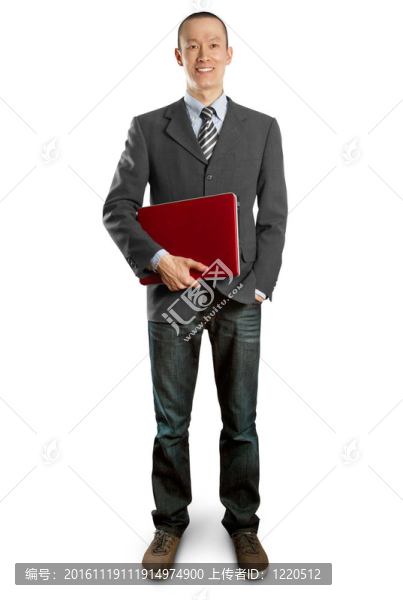 男性在西裝與筆記本電腦在他的手中