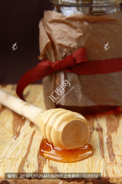 蜂蜜和木勺罐