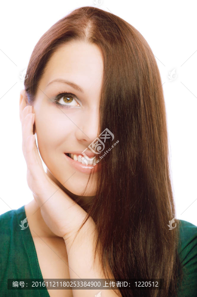 美麗的年輕女子在綠色服裝肖像