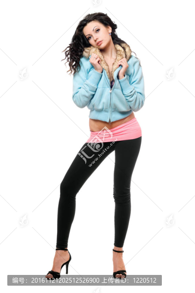在一個黑色的緊身褲，年輕漂亮的女人