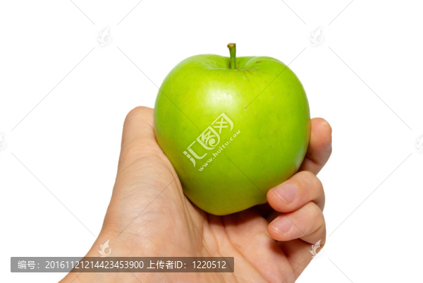 綠色可口蘋果在手上孤立的白色。