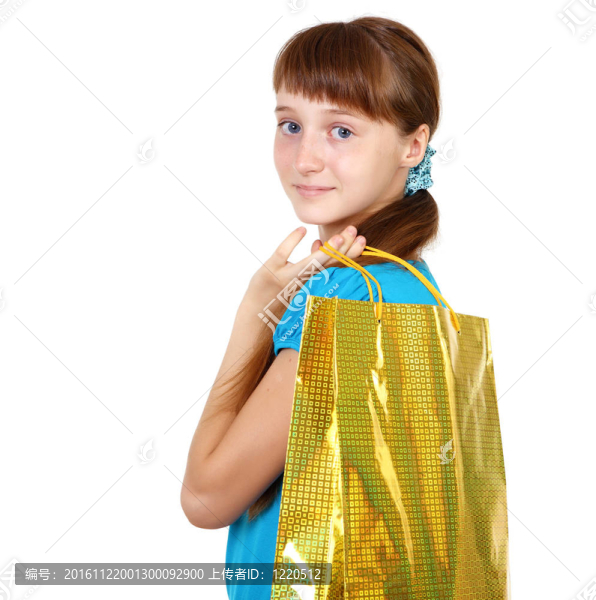 漂亮的十幾歲的女孩與購物袋