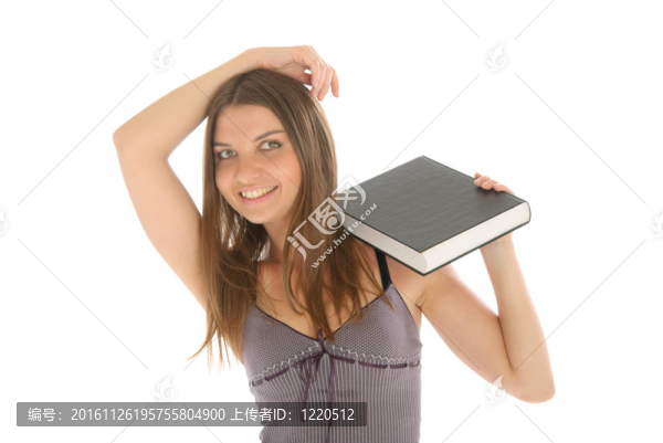 年輕快樂(lè)的女人與書