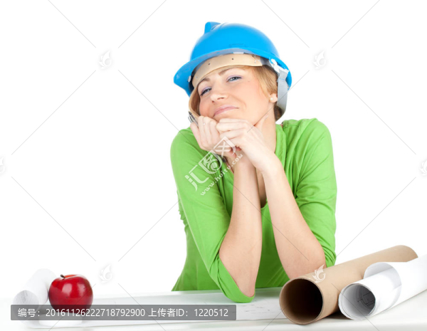 在藍色頭盔蘋果和藍圖的女性建筑師