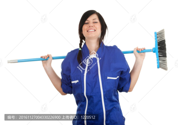 微笑的女人穿著藍色的工作服