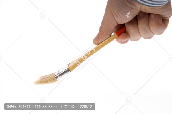 隔離干凈的油漆刷在手