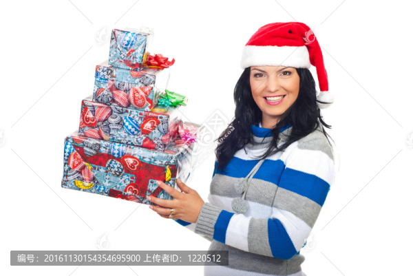 幸福的女人在Santa帽子的禮物