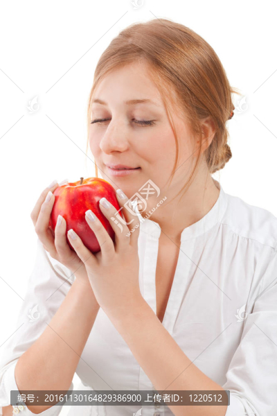 美麗的女人拿著蘋(píng)果