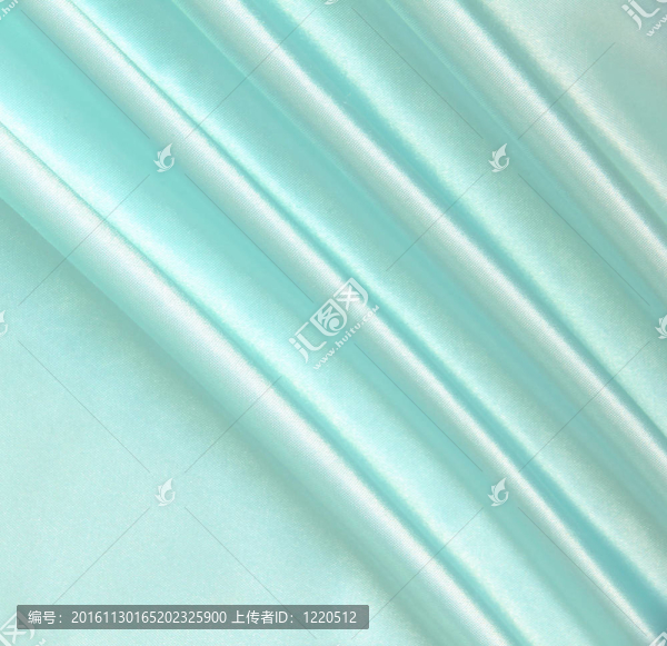 以流暢的優(yōu)雅的藍(lán)色絲綢為背景