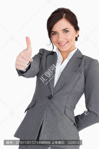 年輕漂亮的女商人的大拇指