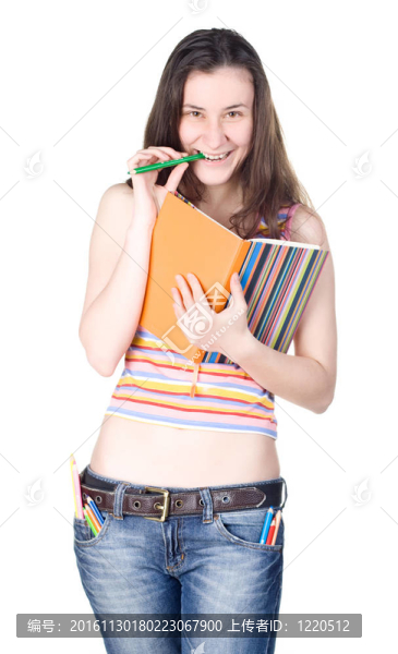 微笑女孩與筆記本咬鉛筆
