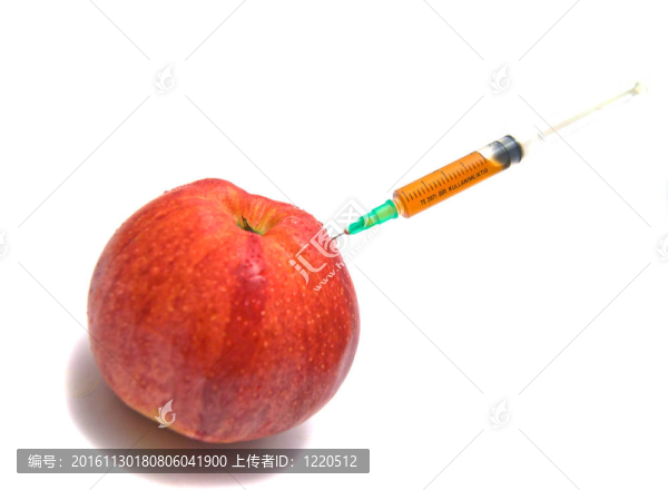 紅色的蘋果和白色的注射器