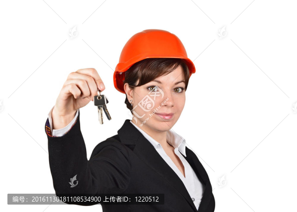 微笑的女建筑師帶鑰匙；在白色背景下孤立