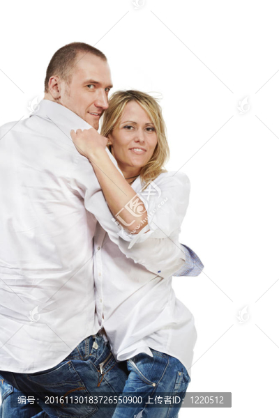 特寫的人，穿著白襯衫和藍(lán)色牛仔褲的女人看起來(lái)好像他們跳舞。