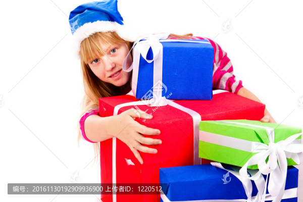 小女孩在Santa的帽子與藍色禮品盒