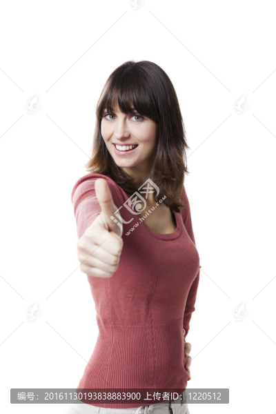 美麗的女人豎起大拇指