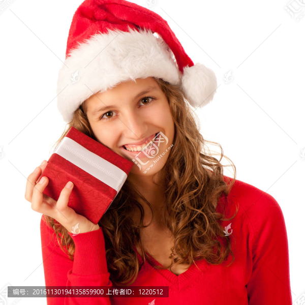 漂亮的女孩穿著像Santa的圣誕禮物