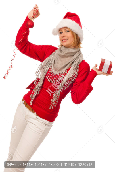 漂亮的女孩穿著像Santa的圣誕禮物