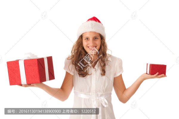 漂亮的女孩穿著像Santa的圣誕禮物