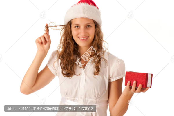 漂亮的女孩穿著像Santa的圣誕禮物