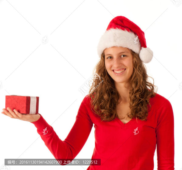 漂亮的女孩穿著像Santa的圣誕禮物