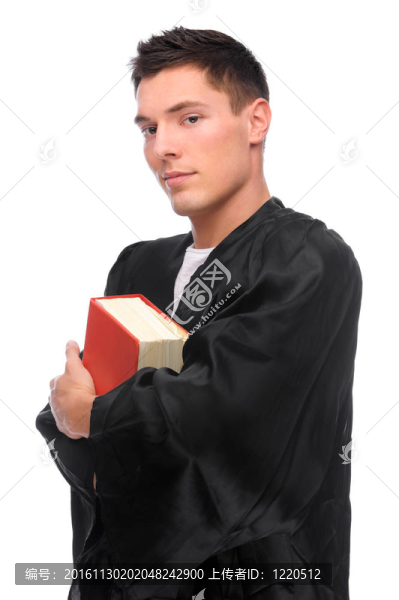 從一個(gè)年輕的法官（律師）與法令書完全孤立的工作室圖片