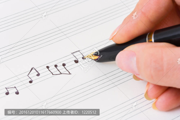 手與筆和音樂表