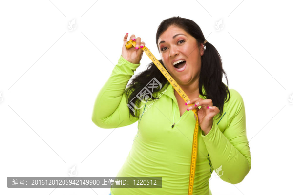 西班牙婦女在鍛煉衣服與卷尺