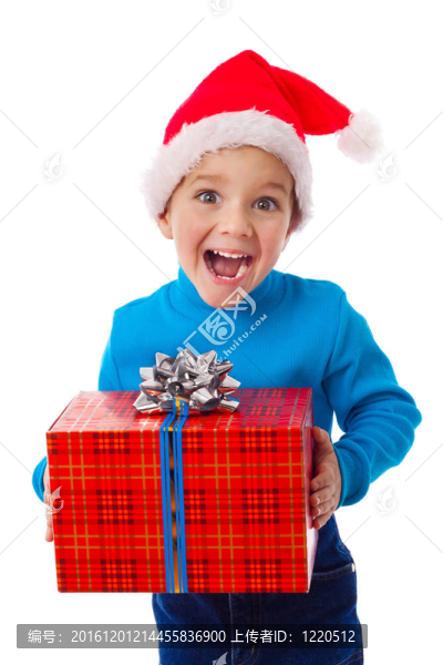 戴著紅盒子的Santa帽子上的笑男孩