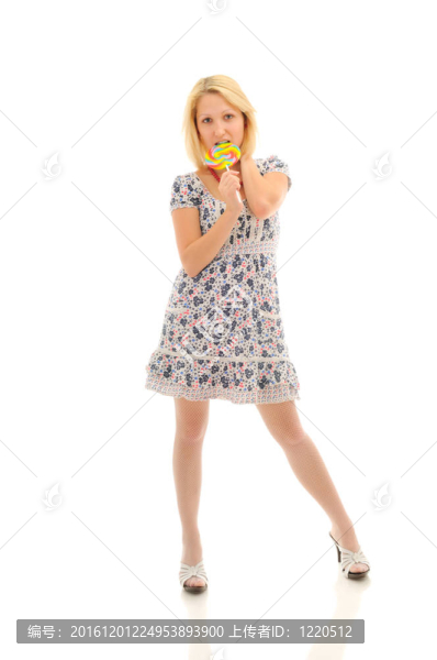 性感的金發(fā)美女舔棒棒糖