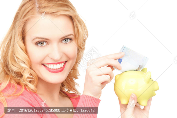 可愛的女人與儲(chǔ)蓄罐和錢