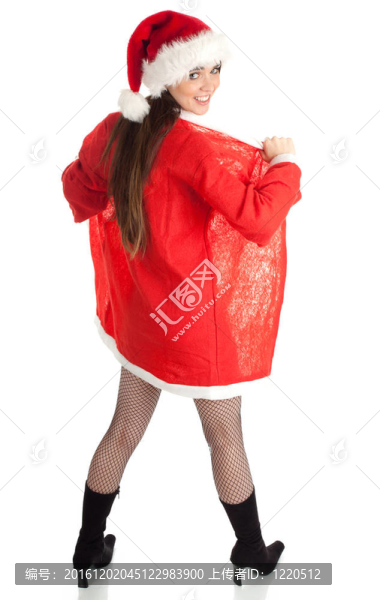微笑的年輕女子穿著紅色的Santa衣服和帽子