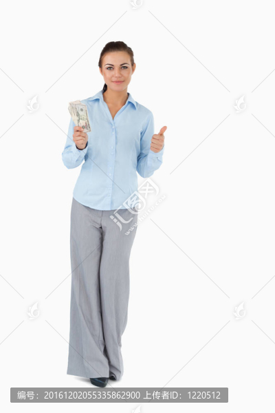 隨著紙幣給大拇指的商人