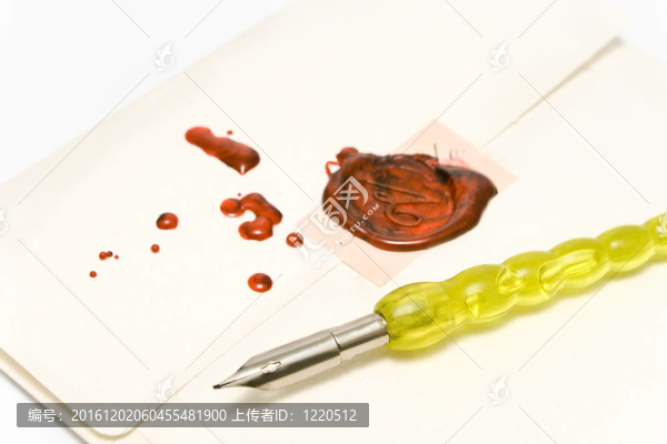 舊鋼筆和蠟封在一封信上