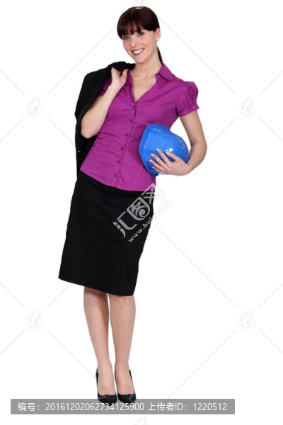 可愛的女建筑站在工作室