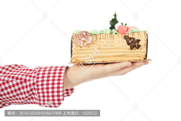 手上的圣誕蛋糕