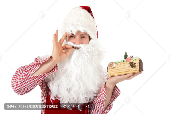 年輕的白人男子圣誕老人；蛋糕